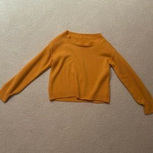 Orange loose neck knit sweater